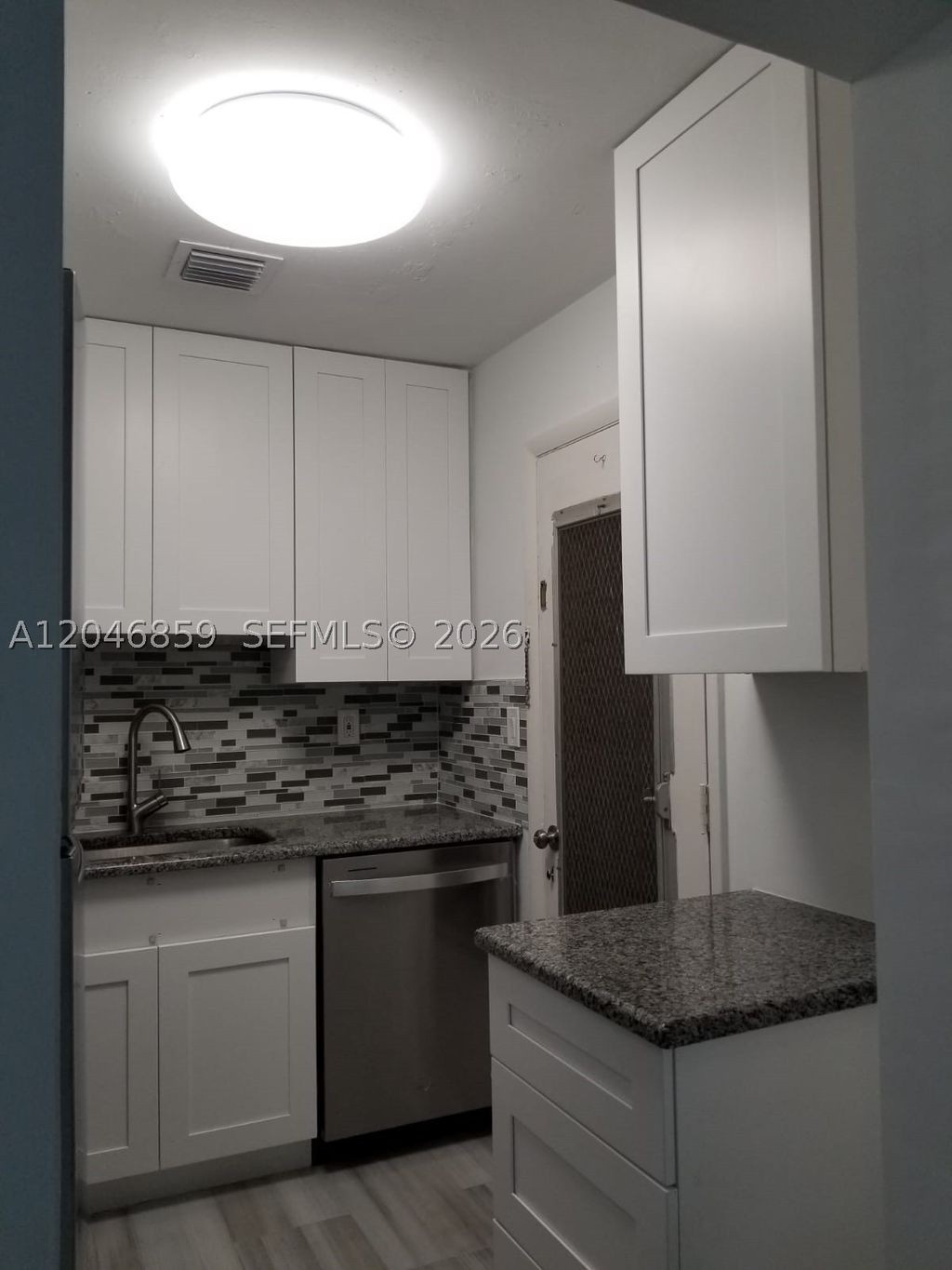 Photo of 2990 NE 16th Ave #105, Oakland Park, FL 33334 (MLS # A12046859)