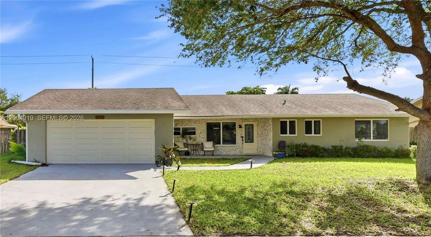 WELCOME TO THIS CHARMING 3-BEDROOM, 2-BATH HOME LOCATED IN THE HIGHLY DESIRABLE SOUTH SHORE NEIGHBORHOOD OF WELLINGTON, WITH NO HOA! IDEALLY SITUATED JUST MINUTES FROM THE National Polo Center, THIS HOME OFFERS BOTH CONVENIENCE AND LIFESTYLE. FEATURING A BRIGHT OPEN-CONCEPT LAYOUT, THE HOME IS PERFECT FOR ENTERTAINING AND EVERYDAY LIVING. THE UPDATED KITCHEN BOASTS QUARTZ COUNTERTOPS, STAINLESS STEEL APPLIANCES, AND AMPLE PREP SPACE. BOTH BATHROOMS HAVE BEEN TASTEFULLY UPDATED WITH MODERN VANITIES AND TILE ACCENTS. ADDITIONAL INTERIOR FEATURES INCLUDE CONTEMPORARY FLOORING, UPDATED FIXTURES. MAJOR UPGRADES INCLUDE A 2020 ROOF, 2019 A/C, AND FULL HURRICANE IMPACT WINDOWS, PROVIDING PEACE OF MIND AND INSURANCE BENEFITS. SITUATED ON A SPACIOUS 8,799 SQ FT LOT, THIS PROPERTY OFFERS PLENTY OF ROOM FOR OUTDOOR ENJOYMENT. STEP OUTSIDE TO A SPACIOUS SCREENED-IN PATIO OVERLOOKING A LARGE, FENCED BACKYARD, IDEAL FOR OUTDOOR LIVING, PETS, OR FUTURE ENHANCEMENTS. THIS HOME IS ALSO EQUIPPED WITH AN EV CHARGER, OFFERING ADDED VALUE. ENJOY A PRIME LOCATION NEAR The Mall at Wellington Green, Tiger Shark Cove Park, TOP-RATED DINING, SHOPPING, AND COMMUNITY AMENITIES INCLUDING SIDEWALKS AND A PLAYGROUND.