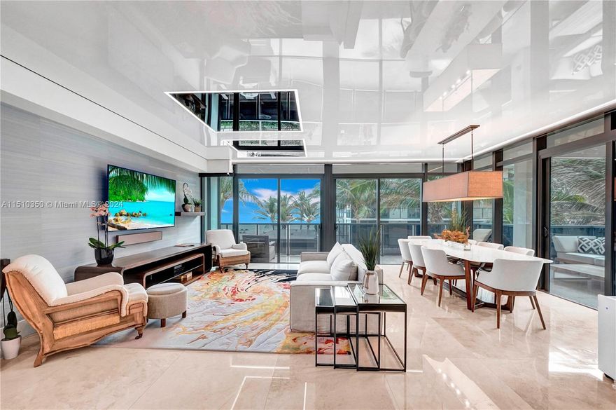 Discover unparalleled luxury in this extraordinary, exquisitely furnished, beachfront property, situated in a coveted 2016 oceanfront boutique building. With 3 bedrooms and 3 baths, this stunning home spans 2,385 sq ft and is adorned with over 20 floor-to-ceiling windows, filling the space with natural light and offering captivating views of the serene oceanfront. The multiple balconies total an additional 450 sq ft. The interior of the apartment is a testament to luxury and elegance. Every inch, including the 36-inch polished, top-of-the-line marble flooring, reflects exquisite taste. A gourmet kitchen equipped with premium appliances such as a Wolf gas range and oven, and a Sub-Zero refrigerator, the digital mood lighting system in the kitchen, and a media room, complete the experience.