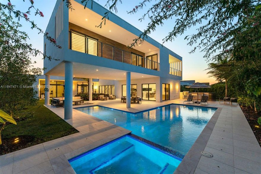 Welcome to this beautifully designed modern residence in the exclusive gated community of Botaniko Weston. This home offers the perfect blend of comfort and sophistication. The main floor features a formal living room, a private guest suite, service room, and an office that can easily be transformed into a media room or personal gym. A casual family room flows into the open-concept kitchen with a large center island, custom cabinetry, and generous counter space. Expansive floor-to-ceiling windows fill the interiors with natural light. Upstairs, you’ll find four bedrooms including a generously sized primary suite with large closet space and a spa-inspired bathroom. Private stunning backyard retreat complete with pool, built-in BBQ, and lush landscaping. Prime location, easy to show