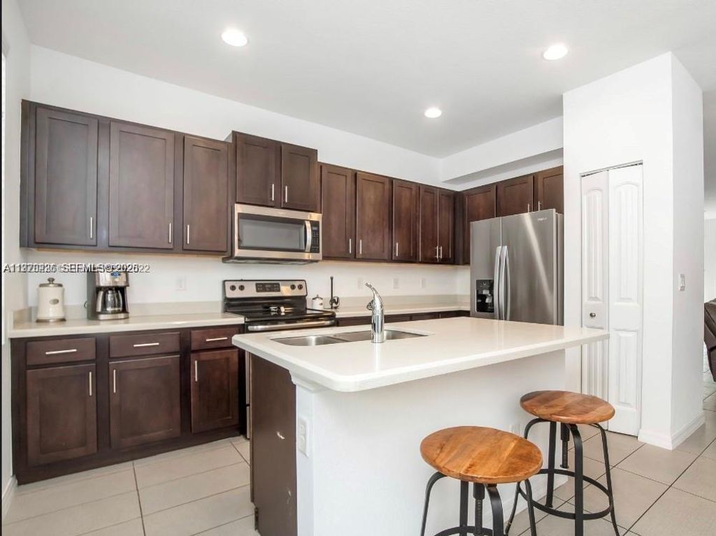 Photo of 3327 NW 10th Ave, Pompano Beach, FL 33064 (MLS # A11970236)