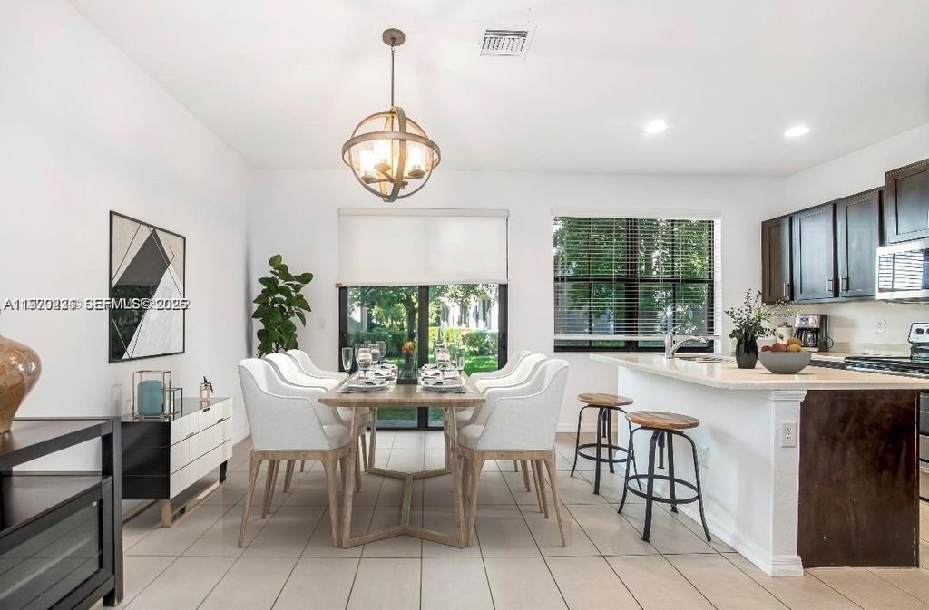 Photo of 3327 NW 10th Ave, Pompano Beach, FL 33064 (MLS # A11970236)