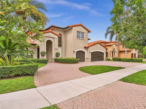 Photo of 8052 NW 161st Ter, Miami Lakes, FL 33016 (MLS # A12030318)