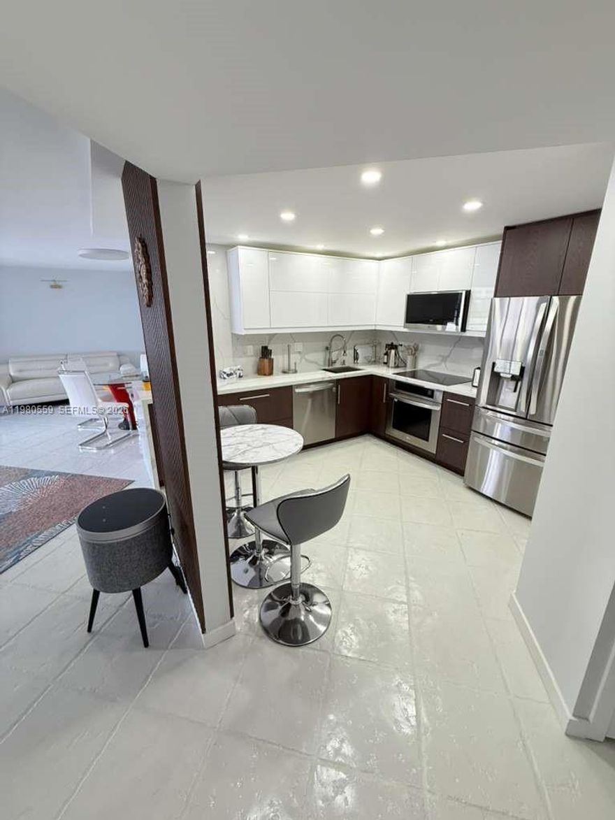 LIVE IN LUXURY AT COMMODORE PLAZA! Perfectly located behind The Fresh Market, this fully remodeled 1 bed, 1.5 bath apartment redefines comfort and style.

Enjoy unobstructed sunset views from this elegant residence featuring a chef-inspired kitchen with top-of-the-line Miele appliances, a spacious layout, and ample storage throughout. Ideally situated in the heart of Aventura, you're just minutes from Aventura Mall, fine dining, parks, and major roadways.

Ideal for professionals, couples, or young families seeking a refined lifestyle in South Florida. Experience luxury living every day!

The designated car parking lot is located on the second level of the garage, covered and conveniently positioned next to the elevator.

The kitchen features a customized design with high-end LG appliances, including a refrigerator, microwave, stove, dishwasher, and a built-in wine cooler, creating a sleek, modern space.

The master bedroom is furnished with brand-new, Italian-made furniture, featuring a king-size bed, two bedside stands, and one dresser. Additionally, a two-story kids’ full-size bed is also available, if needed, as per the rental arrangement.

The living room is elegantly furnished with Italian-designed furniture, featuring two sofas with automatic recliners and a modern dining table.