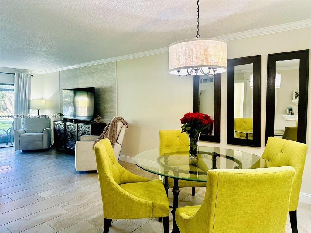 Photo of 437 Lakeview Dr #104, Weston, FL 33326 (MLS # A11954691)