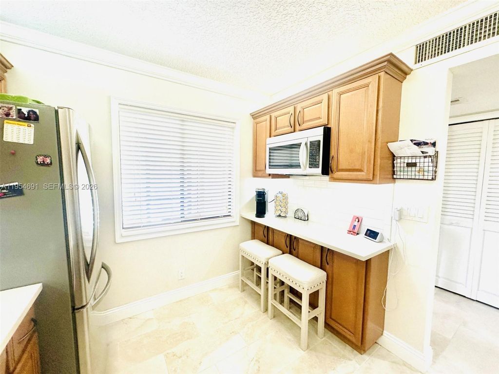 Photo of 437 Lakeview Dr #104, Weston, FL 33326 (MLS # A11954691)