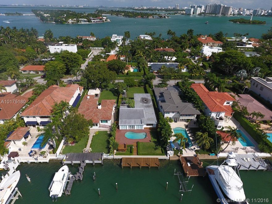 AMAZING OPPORTUNITY TO BUILD YOUR DREAM HOME ON PRESTIGIOUS HIBISCUS ISLAND. 60 FEET OF BAY FRONTAGE WITH RECENTLY REDONE DOCK AND STUNNING OPEN VIEWS OF BAY, DOWNTOWN AND PORT OF MIAMI. ORIGINAL 1953 HOME WITH 2,324 SF AND GORGEOUS POOL AREA ON 10,500 SF LOT. ENJOY EXCLUSIVE ISLAND LIFESTYLE OFFERING SECURITY, PRIVATE PARK FOR RESIDENTS, BASKETBALL AND TENNIS COURTS, AND CHILDRENS PLAYGROUND. EASY ACCESS TO EVERYTHING SOUTH BEACH AND DOWNTOWN HAVE TO OFFER. CALL LA FOR EASY SHOWING.