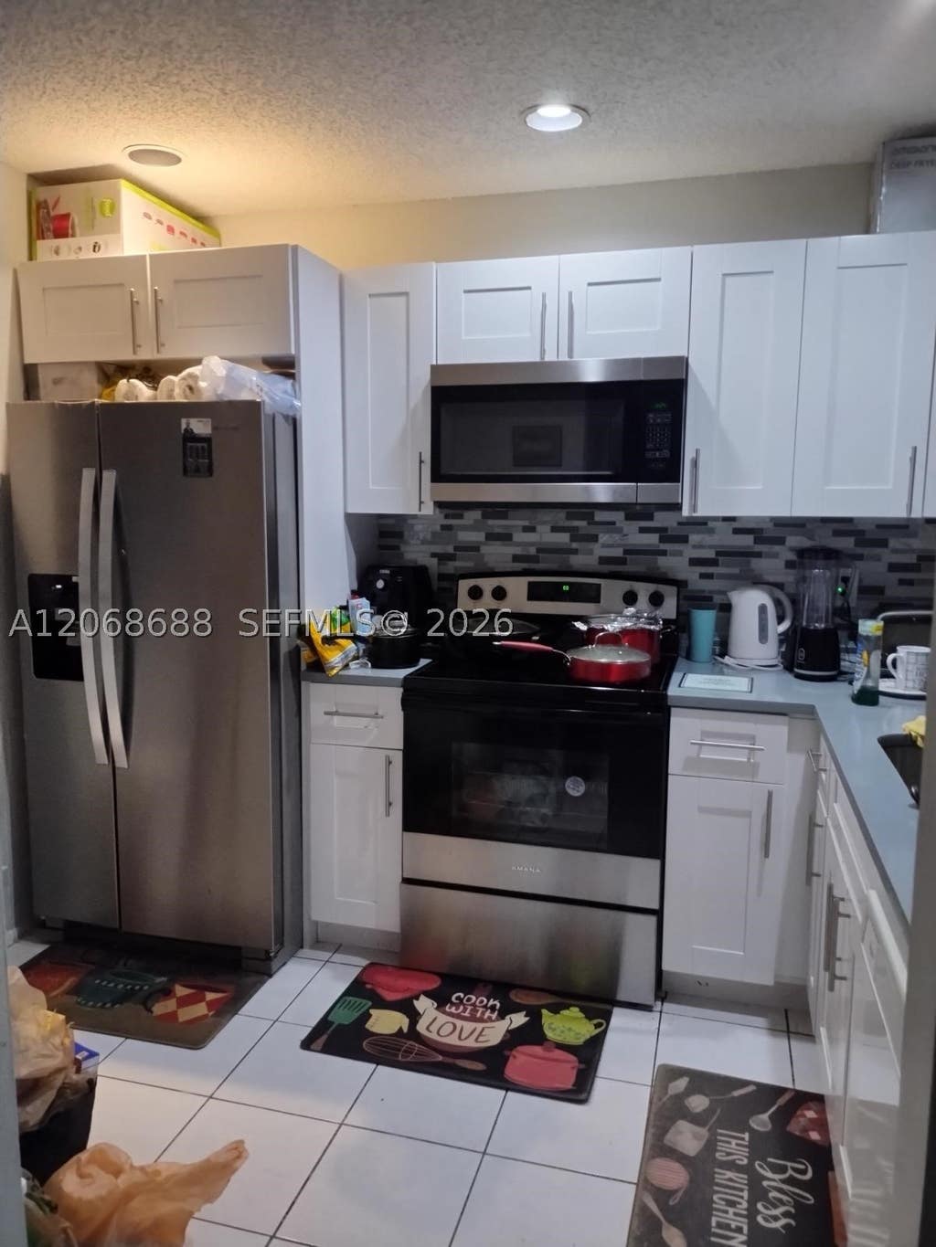 Photo of 9218 NW 1 St #202, Pembroke Pines, FL 33024 (MLS # A12068688)