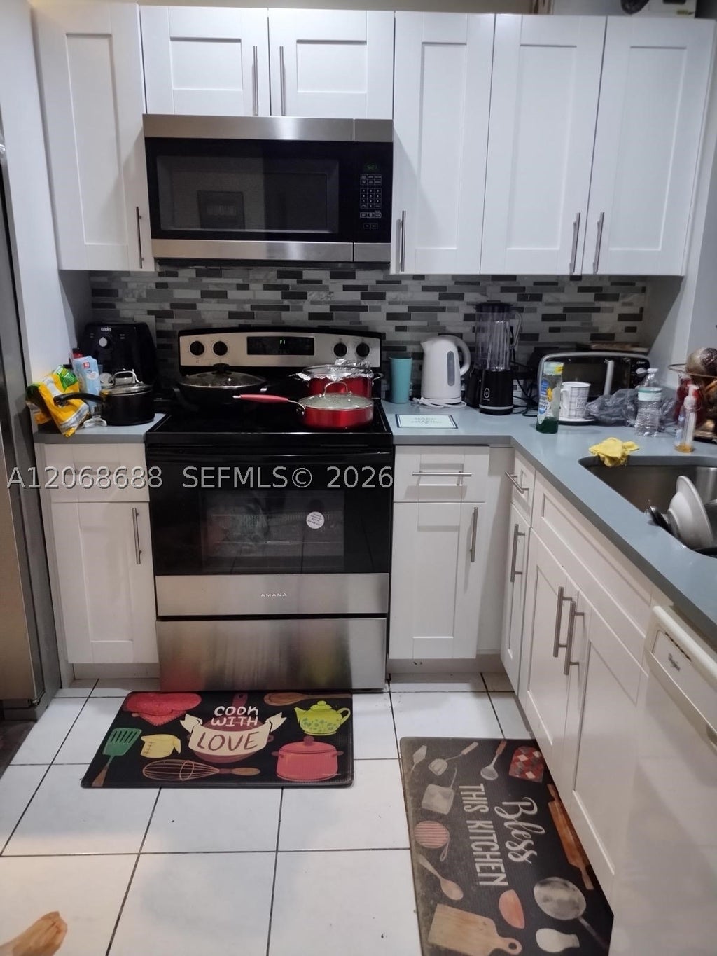 Photo of 9218 NW 1 St #202, Pembroke Pines, FL 33024 (MLS # A12068688)