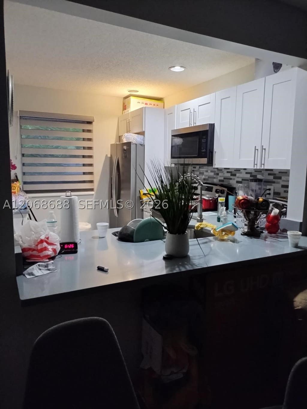 Photo of 9218 NW 1 St #202, Pembroke Pines, FL 33024 (MLS # A12068688)