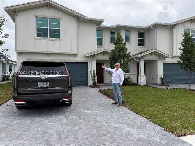 Photo of 19861 Whispering Creek Rd #225, Loxahatchee, FL 33470 (MLS # A12079784)