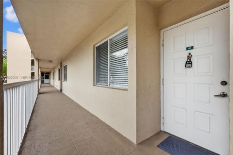 Photo of 9525 Weldon Cir #H205, Tamarac, FL 33321 (MLS # A11953009)