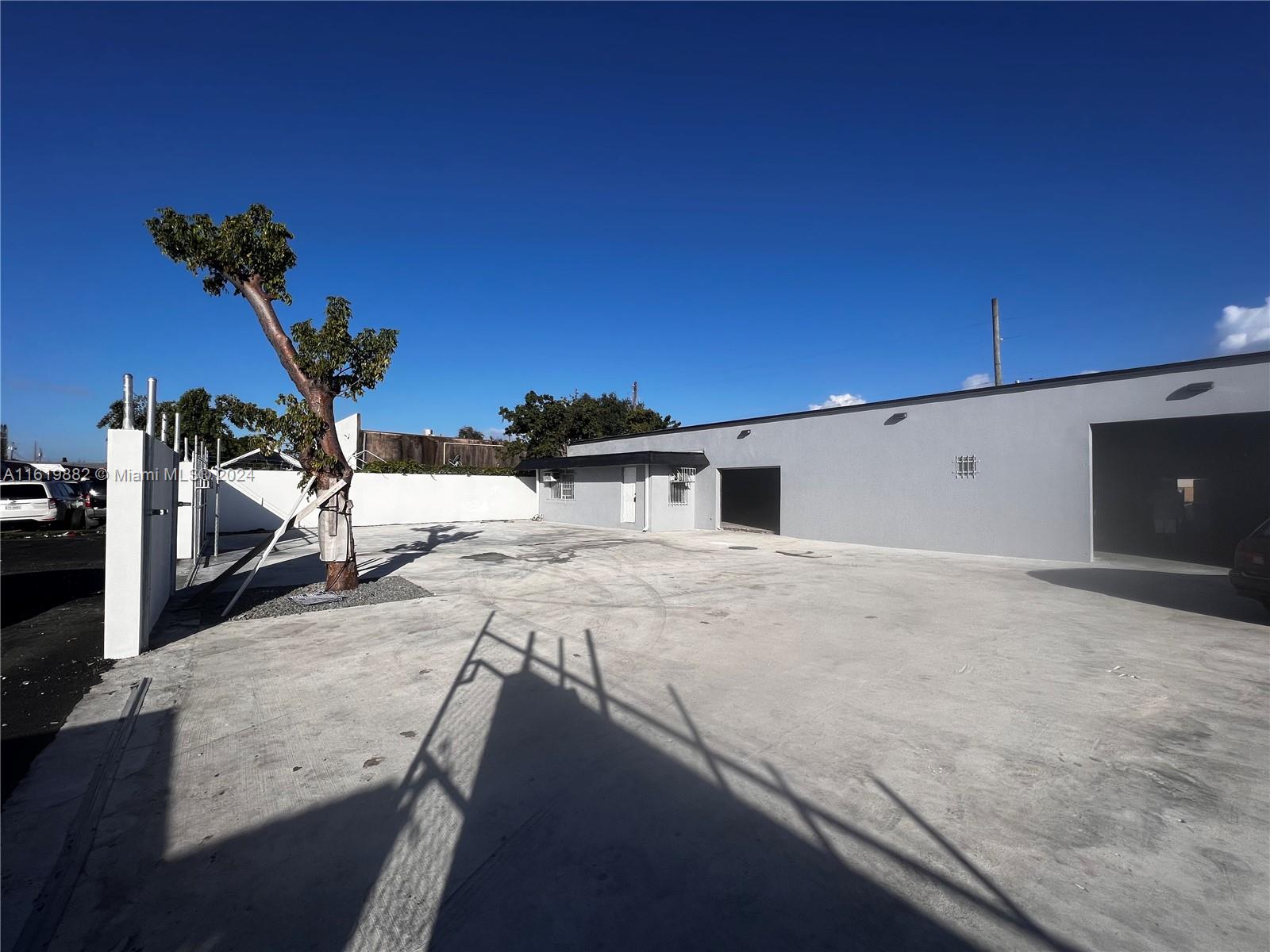 The property is strategically located just east of US 441/State Road 7 Between Hollywood Blvd and Pembroke Rd
and is within close proximity to Florida's turnpike and interstate I-95. The physical property is a 5,200 SF
warehouse sitting on a large 10,489 SF fully fenced-in lot. The property is set up as a single unit with high 12'
ceilings, an office space and a mezzanine. The property is in great overall condition.