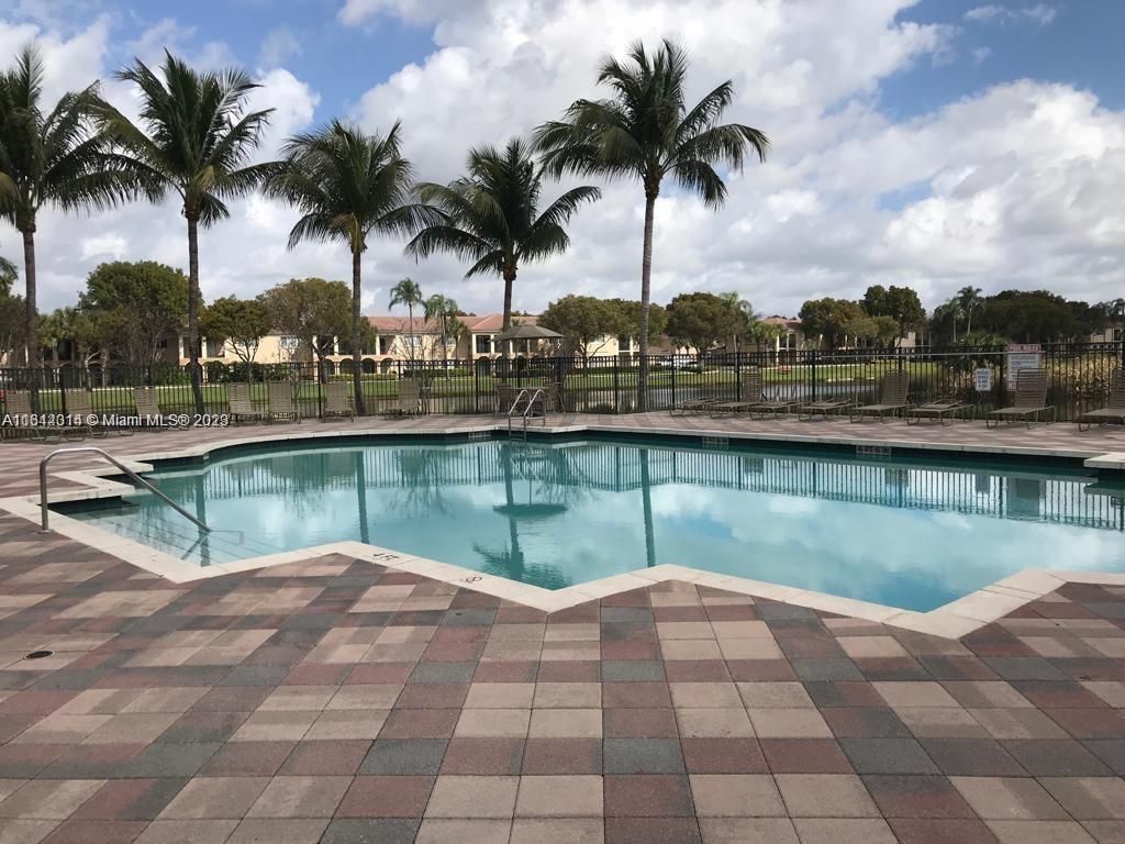Photo of 2442 Centergate Dr #204, Miramar, FL 33025 (MLS # A11344014)