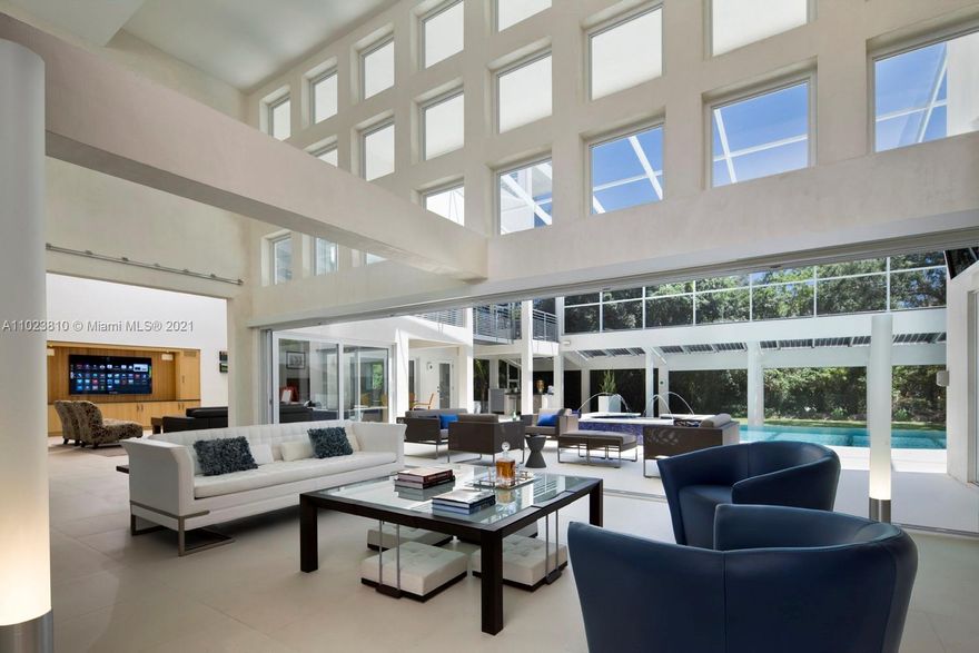 Award-winning, nearly new, all concrete construction clad in French limestone. Overlook Deering Bay and downtown Miami from your 35-foot tower in a park-like setting. Security staffed and guard gated. High elevation east of Old Cutler. Lauded in Architectural Digest in June 2021, and previously featured in Florida Design. Pinecrest's premier LEED Gold Home. AIA COTE Award and the US Green Building Council Home of the Year. 7,526 adjusted SF with 40-foot infinity-edge enclosed indoor-outdoor living. Control4 shades, lights, AV, security, and state-of-the-art AC. Designed to WELL Building Standards. One-of-a-kind trophy property, iconic architecture, ideal for both executives and celebrities.