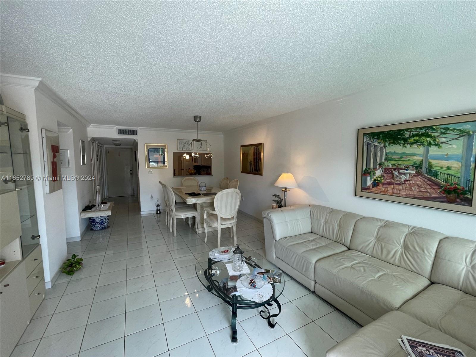 BEAUTIFUL AND SPACIOUS UNIT WHICH IS WALKING DISTANCE FROM THE OCEAN (JUST TWO BLOCKS AWAY FROM COLLINS AVENUE). UNIT HAS GRANITE COUNTERTOPS, PLENTY OF CLOSET SPACE AND A BALCONY OVERLOOKING THE CITY LIGHTS. UNIT HAS ALSO A WASHER AND DRYER.
