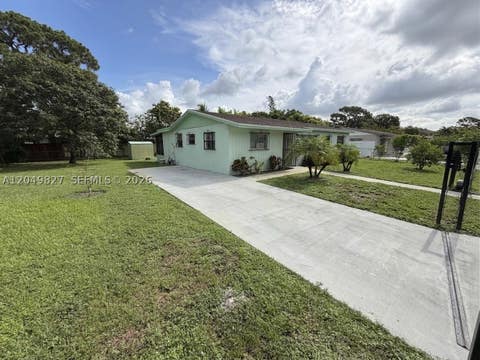Photo of 3851 NW 210th Ter, Miami Gardens, FL 33055 (MLS # A12049827)