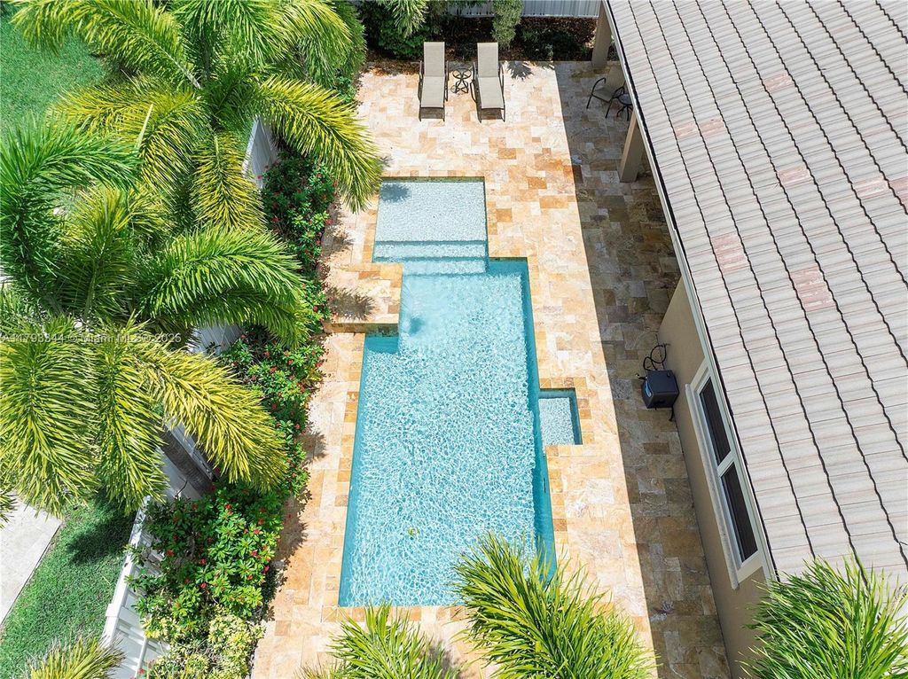 Photo of 6017 NW 56th Circle, Coral Springs, FL 33067 (MLS # A11793344)