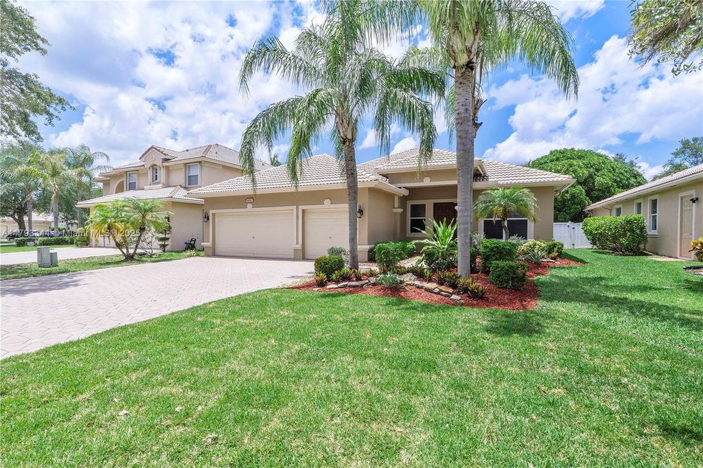 Photo of 6017 NW 56th Circle, Coral Springs, FL 33067 (MLS # A11793344)