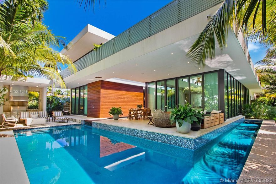 Stunning modern oasis on prestigious Sunset Island 3 that defines the perfect tropical Florida lifestyle. Large corner lot, newly constructed 5900 SF home, 6 beds, 7 baths, half bath, heated pool, 2 car garage, gated, lush tropical landscaping. Spacious and inviting, with lofted ceilings, gourmet kitchen, oak and marble flooring, and telescopic sliding doors that seamlessly blend indoor-outdoor living. Large covered lounge terrace, Ipe wood wall, reflecting ponds, wrap around pool, summer kitchen, cabana bath, canoe/board rack, and private guest suite. Spacious Master with private terrace, large closet, spa-like bath. Stylish, functional features include smart home system, rooftop terrace. Sunset Islands 3&4 are steps to Sunset Harbour shops and dining, moments from the beach & causeways.