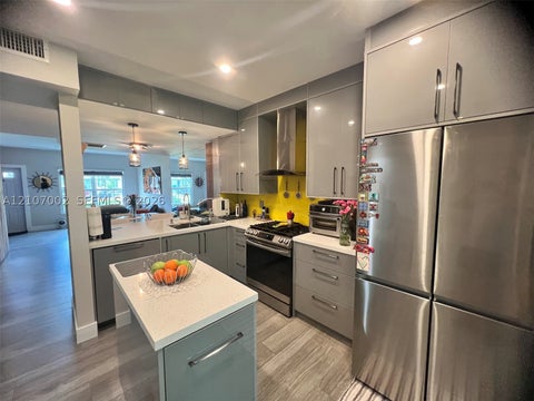 Photo of 7830 Dixie Beach Cir, Tamarac, FL 33321 (MLS # A12107002)