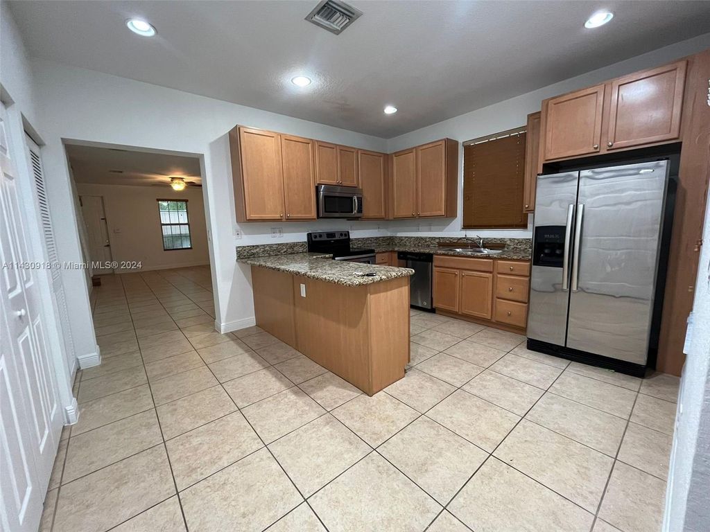 Photo of 1101 SW 147TH TE, Pembroke Pines, FL 33027 (MLS # A11430918)