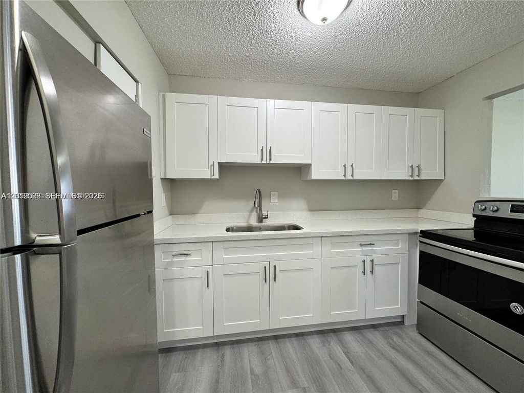 Photo of 2237 Taylor St #6B, Hollywood, FL 33020 (MLS # A12019528)