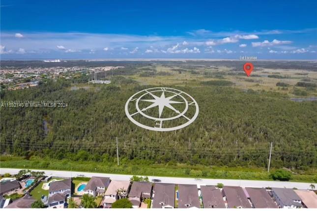 Exceptional Investment Opportunity in Residential Lots! A motivated seller offers two prime lots in an undeveloped area of Miami-Dade County. Seize the opportunity to protect your investments from inflation by investing in real estate. Purchase now and secure the potential for future development. These plots are ideally located just beyond the urban boundary line, surrounded by numerous established residential communities, positioning between SW 26th St and 158th Ave. Refer to the folio for precise locations. A second lot is available separately, with consideration for a bundled offer. Please note, currently, there is no direct access to the property.