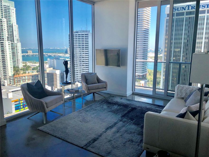 Amazing corner unit at the ‘Centro’ loft building. Breathtaking views of the city and ocean. Open space with floor to ceiling windows. Italian kitchen and SS appliances. Washer & Dryer. Rooftop pool with all around views, Skyline Lounge and social room, Health club & Spa. Walk to Whole Foods, restaurants and City Center. **No parking space. Valet membership $235/month. Rent includes internet & water, Provided by the association.