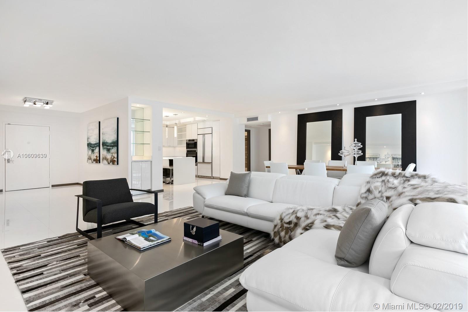 The absolute best unit in Bal Harbour! Stunning 3 bedroom with all the bells & whistles. This open, light, and airy floor plan just underwent a major renovation and features the best quality and design around. Almost 2,600 SQ ft with an oversized terrace and spectacular views to the intracoastal and ocean. The condo features a large kitchen with all top of the line appliances, Italian cabinetry, white quartz countertops, wine refrigerator, and built in island with seating. Pure white glass 32X36 floors throughout with custom doors, recessed lighting and electric blinds to name a few features. The master is appointed with your own spa-like bathroom with a free standing tub, Rain shower with LED lighting, shiny Italian porcelain walls,  double sinks, and handmade wood his & hers closets.