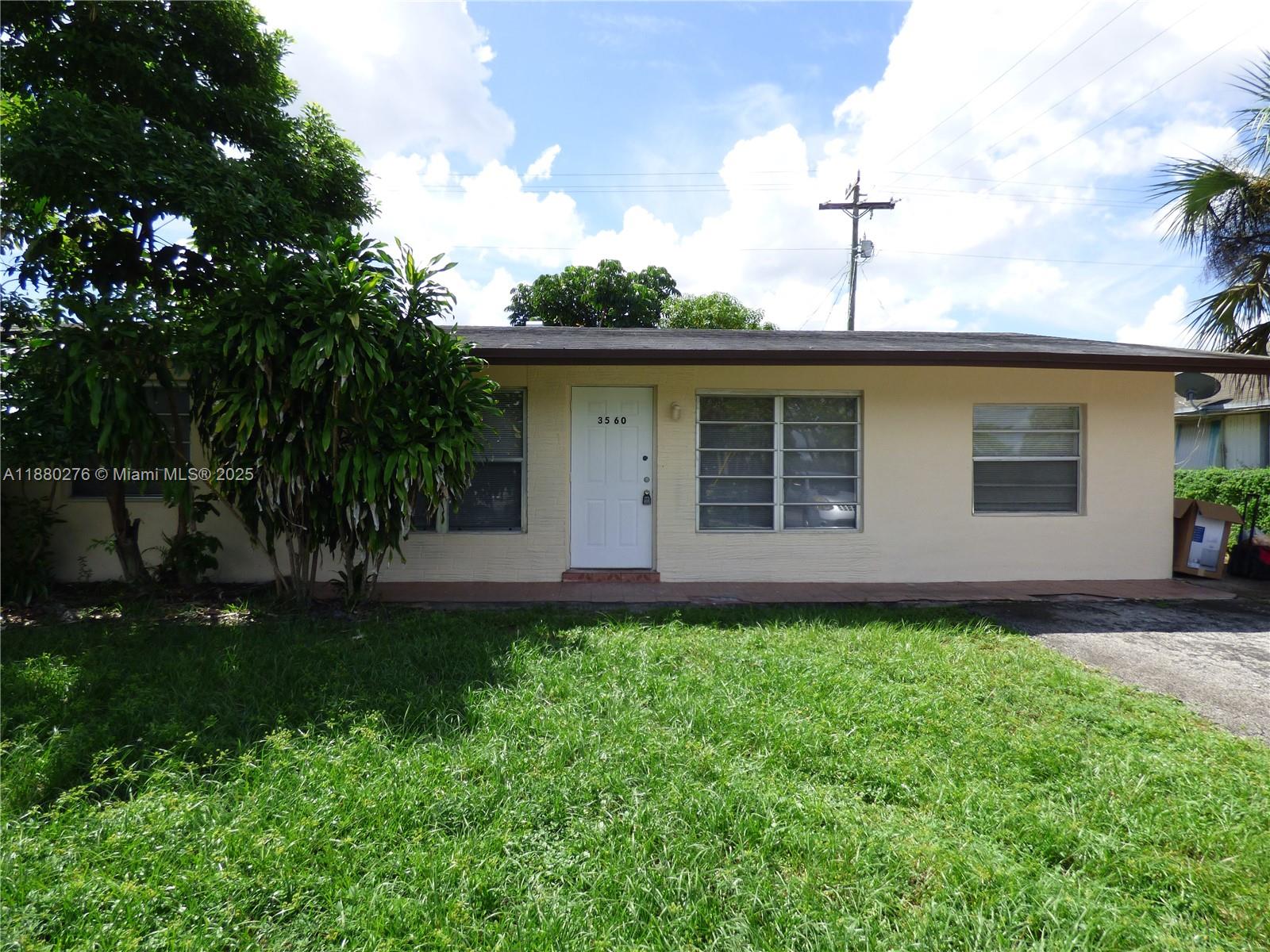 Lauderhill. Just Remodeled. 4 Bedroom. 2 Bath. Florida Room. New Ceramic Tile Floors. Modern Kitchen & Baths. Central Air. Room to Park 4 Cars. Fully Fenced. Mango Tree. The landlord requires the first month’s rent, two months' security deposit, a credit score of at least 650, a clean background check, and a monthly income of at least $5,700.