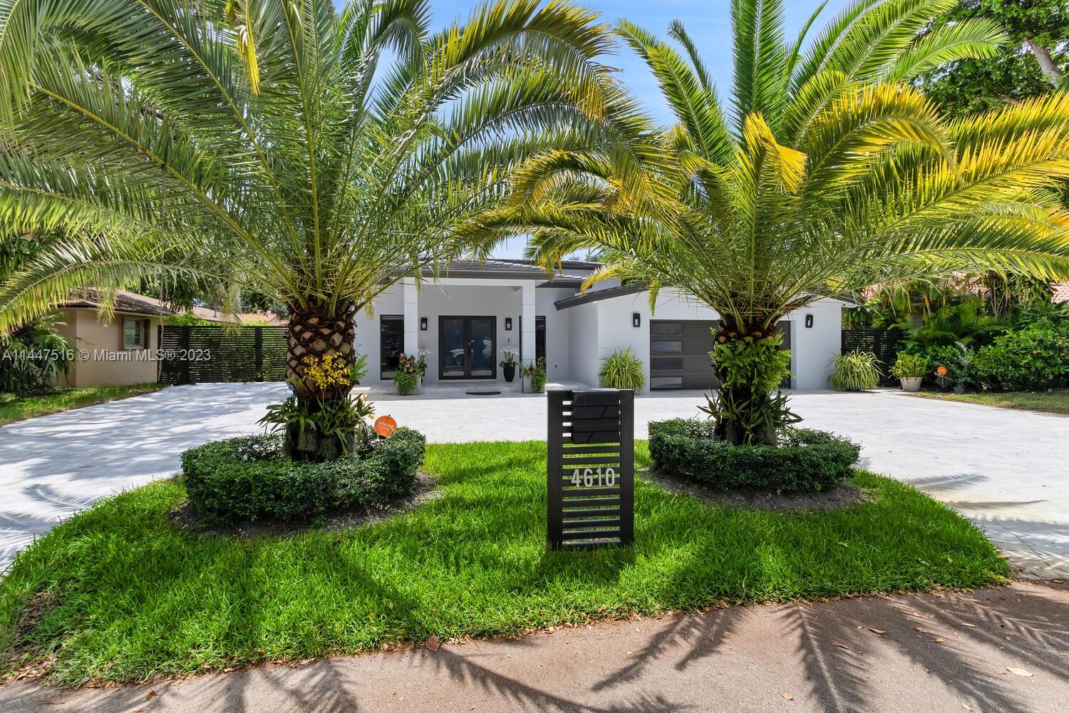 This 2-story Little Gables masterpiece, completely redone in 2022, sits on over 10,000 sqft of land & offers unparalleled luxury. Boasting 4 beds/4 baths with details designed to impress. Each bedroom is a haven with California closets, blackout curtains, & spa-like bathrooms. The custom kitchen features white wood cabinetry & a 15’ island making it a delight for families & culinary enthusiasts. You'll relish in modern upgrades from stainless steel appliances to new electric, plumbing, ceramic flooring, & brand-new roof. Other features include impact windows, 10' high ceilings, LED lighting throughout, filtered water system, upgraded septic tank & drain field, & comprehensive camera system. The outdoor terrace invites you to entertain with views of the brand-new saltwater filtration pool.
