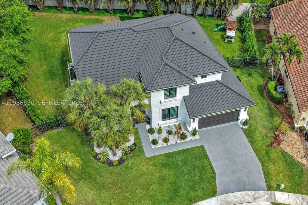 Photo of 10081 Umberland Pl, Boca Raton, FL 33428 (MLS # A11986890)