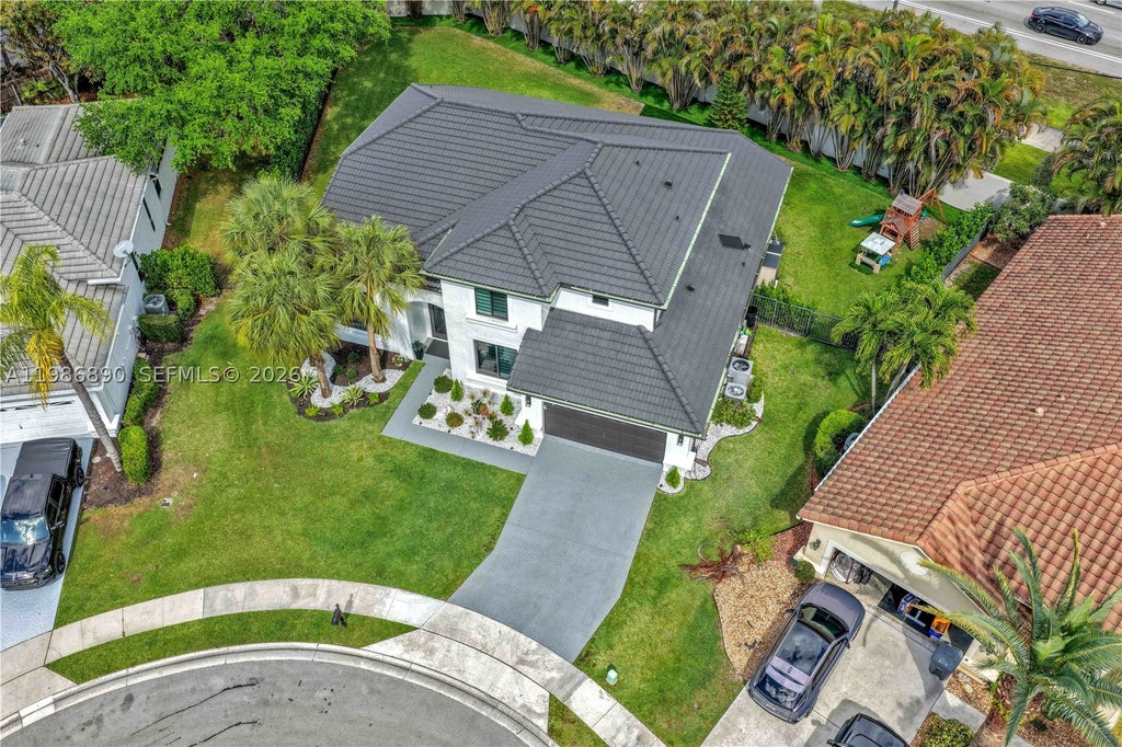 Photo of 10081 Umberland Pl, Boca Raton, FL 33428 (MLS # A11986890)