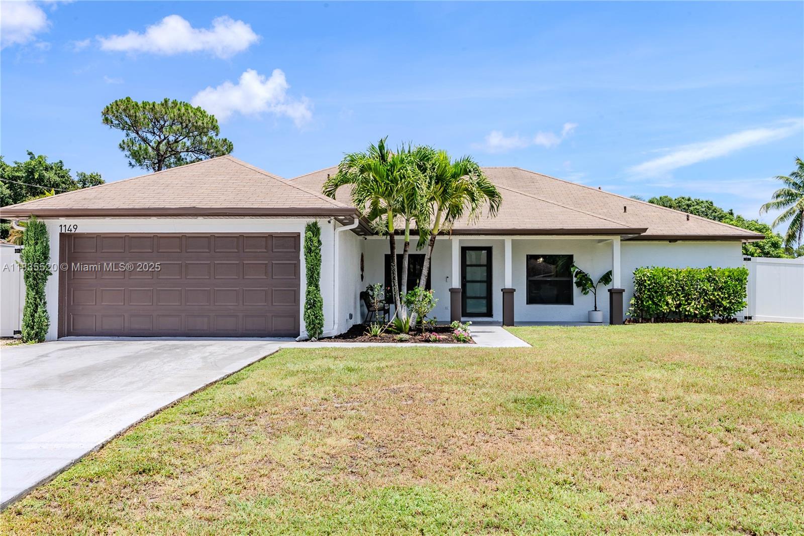 Completely renovated & move-in ready! This stunning 5-bed, 2-bath single-family home in the heart of Port St. Lucie offers modern luxury & thoughtful design throughout. Featuring elegant porcelain floors, a spacious open floor plan, vaulted ceilings, & a split-bedroom layout for added privacy. The primary suite is a true retreat, boasting a spa-like bathroom with a stand-alone soaking tub, sleek modern finishes, & a tranquil ambiance. Perfect for entertaining, the backyard is equipped with a built-in grill, outdoor shower & plenty of space to add your dream pool. Enjoy peace of mind with hurricane impact windows & doors. Plenty of space to park your boat or RV! A blend of style, comfort, and function—perfect for families & those who love to host. Don't miss this beautifully upgraded gem!