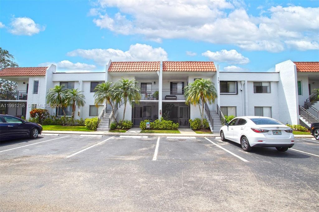 Photo of 304 Racquet Club Rd #203, Weston, FL 33326 (MLS # A11991218)
