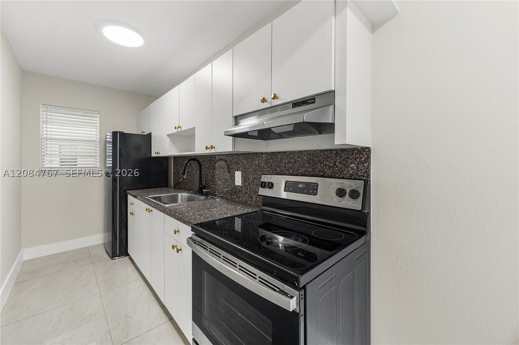 Photo of 1720 Cleveland St #111W, Hollywood, FL 33020 (MLS # A12084767)