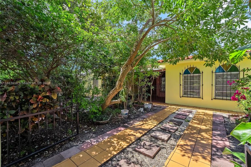 REDUCED TO SELL! 5/3 INCOME-producing home in Shenandoah in the heart of Miami! This 5-bed property sits on a 6,000! SQFT lot and offers a main home perfect for living and a rear unit ideal for Airbnb/rental. Enjoy lush front gardens, a gated porch, multi-use living areas, garage, laundry, and large dining/living spaces. The back 2 bedrooms, updated in 2011, has a separate AC, new water heater, living room, dinning, storage & more! With great bones and layout, this home is READY FOR YOU to ignite your vision/transformation! Steps from Calle Ocho, restaurants, art, transit & schools. This home offers urban excitement with classic charm. Incredible flexibility, unbeatable location, and strong market comparables make this one a standout.