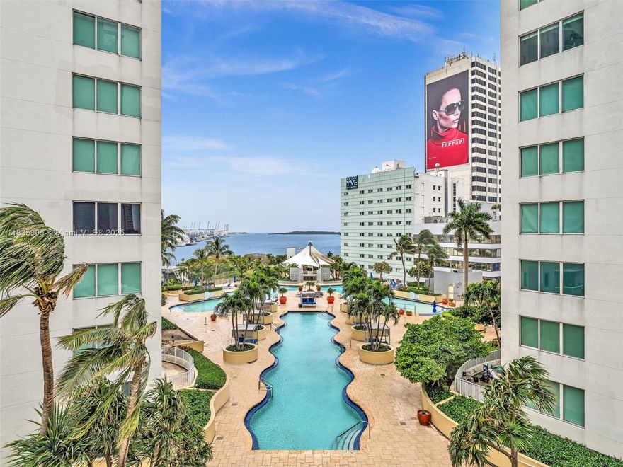 Live in the heart of Downtown Miami in this stunning corner unit featuring 1 master bedroom, a large den converted into a second bedroom or office, 2 full bathrooms, & breathtaking floor-to-ceiling city & Bay views. This luxury condo boasts porcelain flooring, an open kitchen, spacious walk in california closets, in-unit washer and dryer, & an assigned parking space with a large storage unit space. Located in a high-end, full-service building, enjoy 4 pools, a hot tub, poolside bar, spa, gym, business center, theatre, office space, massage room, cold plunge, & more. Unbeatable location! Walking distance to Bayside Mall, Kaseya Center, parks, museums, event spaces, offices, Metro Mover, & top restaurants. Available for 6 month or 1 year.