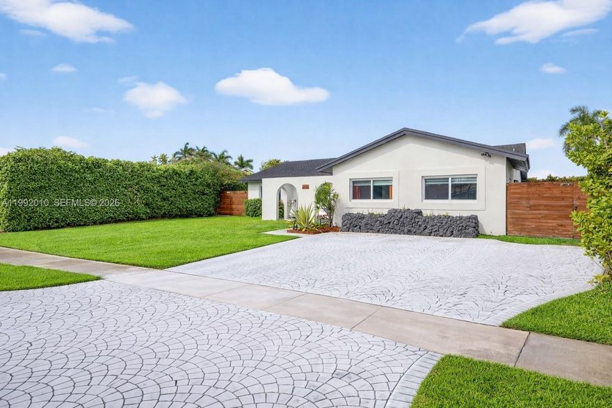 Welcome to this beautifully renovated home in the highly sought-after Bent Tree neighborhood of Kendall! Thoughtfully updated from top to bottom, no detail has been overlooked. Recent improvements include new flooring, exterior paint, new A/C, impact windows and doors, zebra blinds, along with a stunning modern kitchen, with chefs pantry, and 2 fully updated & spacious bathrooms. Step inside to an open and airy layout filled with natural light and serene backyard views from the moment you enter. The home features a formal living and dining area just off the kitchen—perfect for entertaining—plus an additional den/family room for added flexibility. Offering 3 spacious bedrooms plus a versatile extra room ideal for a 4th room, office/den, or guest room- this home is designed to fit a variety of lifestyles! The backyard is truly an entertainer’s dream, featuring a large covered terrace, outdoor kitchen and bar area, ample space for a pool, and two storage sheds for added convenience, huge lot over 9000 SqFt. This move-in ready gem checks every box—don’t miss your opportunity to make it yours!