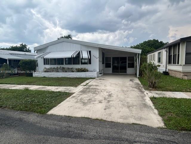 Welcome to Highland Meadow Estates, 55+, where this charming 2 bedrooms 2 bathrooms mobile home awaits, the land is included, Great location on a quiet street. Gated community. Large community pool, tennis courts, pickleball, putting green, golf driving setup, very well maintained community and low HOA. Close to shopping and restaurants and 15 minutes to Deerfield Beach.. MUST SEE!
