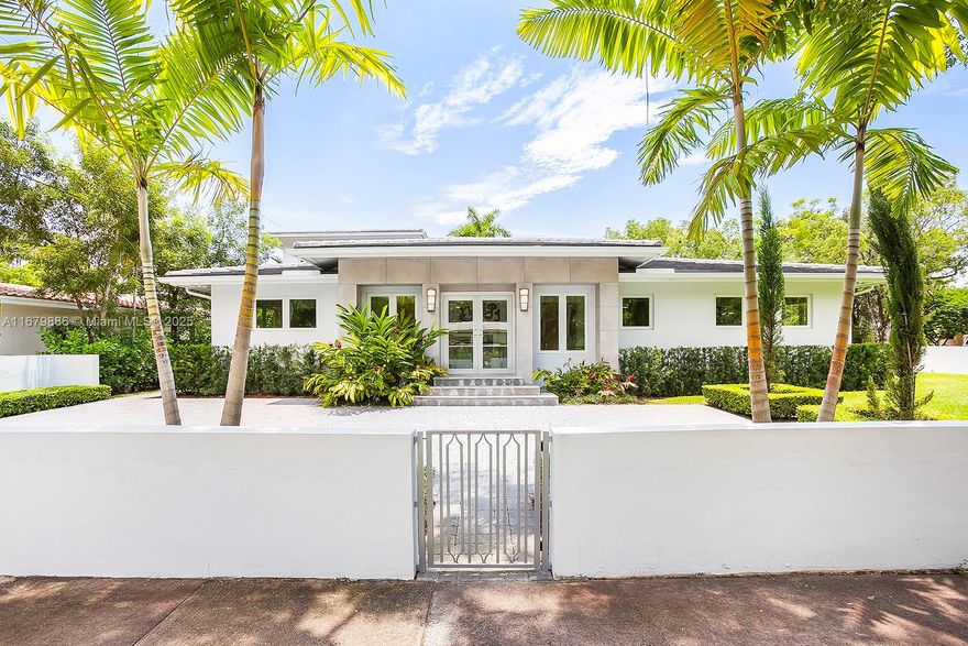 Built in 2017, this beautiful 4-bedroom, 4.5-bathroom home is situated on a spacious 10,200 sqft corner lot in Coral Gables, in a peaceful neighborhood near Granada Golf Course, Gables Country Club, the Biltmore Hotel, Salvadore Park, & the vibrant shopping & dining on Miracle Mile. The home features clean, modern design with an open kitchen that seamlessly flows into the family room, dining area, & living room. It offers 2 ensuite bedrooms on the first floor & 2 upstairs, including a luxurious primary suite. All windows & doors are impact-resistant, ensuring security & peace of mind. Outside, enjoy a stunning salt-water pool, generous covered entertainment areas, & plenty of parking on two sides, along with a 1-car garage. This home is the perfect blend of style, comfort, & convenience.