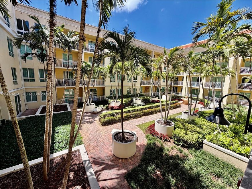 Lowest price in the building.  Do not miss this opportunity.  Welcome to the lively lifestyle of Downtown Dadeland.  Beautiful corner unit awaits you at Toscano Dadeland overlooking the meditation garden.  Updated with tile floors throughout, granite countertops, stainless steel appliances, new washer and dryer, new AC, updated bathroom.  Walking distance to restaurants, shops, Publix all at your doorstep. 
Community offers concierge service, residents club, gym. pool, BBQ area, meditation garden, security, complimentary valet parking. HOA includes basic cable, basic wifi and water, 1 covered parking assigned.