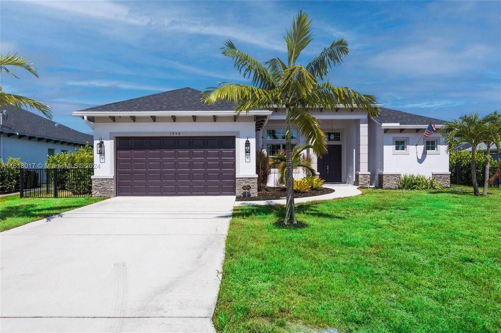 Photo of 1958 SE Gaskins Cir, Port Saint Lucie, FL 34952 (MLS # A11618017)