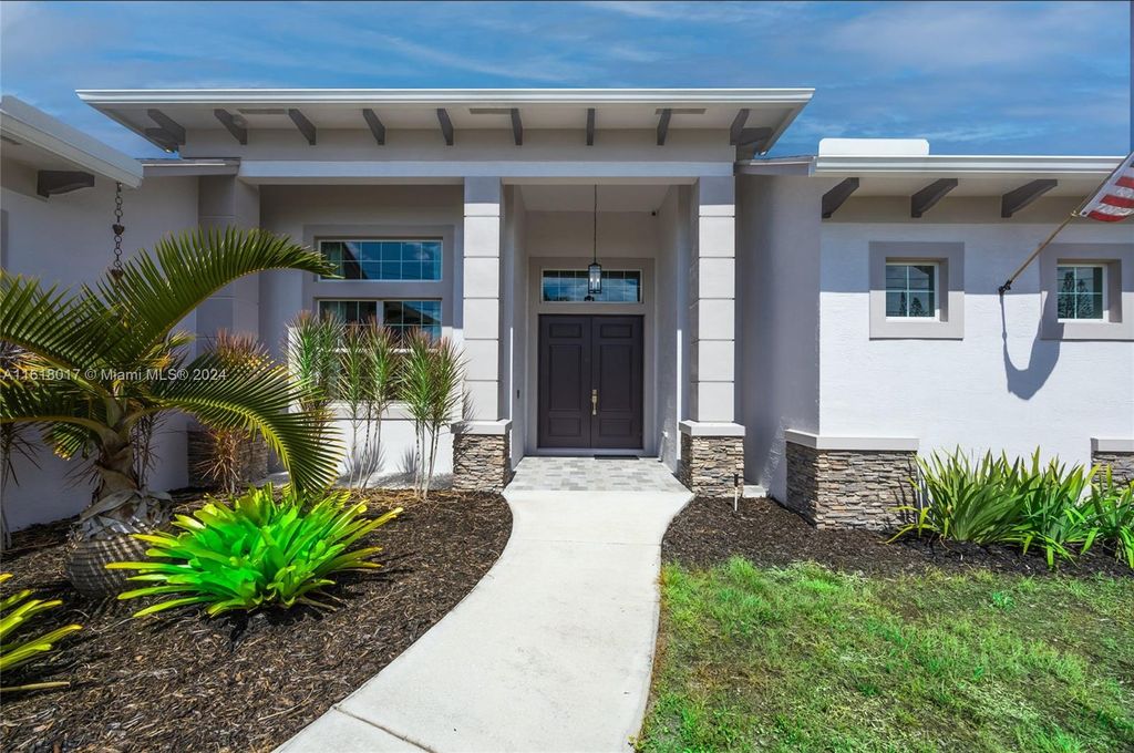 Photo of 1958 SE Gaskins Cir, Port Saint Lucie, FL 34952 (MLS # A11618017)