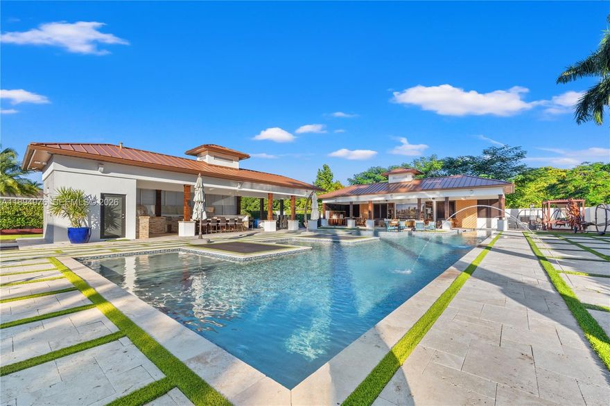 This privately gated JG Heads Farms estate blends style & fun with a sleek modern interior & an incredible outdoor space. The backyard is a dream come true for hosts. Guests can enjoy multiple gazebos complete with a fully equipped kitchen, bar, 4 LED TVs & a full bathroom, or lounge by the Olympic-size pool on tanning beds. A basketball court, putting green, & dedicated pet area add even more versatility. Further enhanced by an EXTENSIVE indoor/outdoor surround sound system & cryo-fog machines, setting the stage for unforgettable gatherings. Indoors, you'll find 4 spacious bedrooms & 4 bathrooms, fully revamped with elegant finishes. The open floor plan creates a seamless flow, perfect for family living. Don’t miss out on this unique estate!
