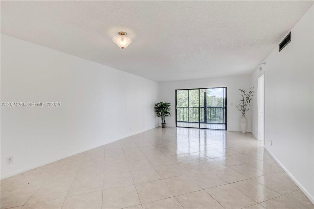 Photo of 2205 S Cypress Bend Dr #508, Pompano Beach, FL 33069 (MLS # A12024280)