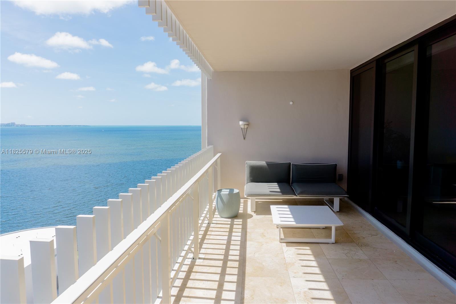 Soaring above sparkling Biscayne Bay with direct ocean access, this beautifully remodeled 2BD/2BA residence is located in the exclusive community of Grove Isle. Enjoy breathtaking open views of Biscayne Bay and the Atlantic Ocean beyond. The home features elegant marble flooring, a brand-new open-concept gourmet kitchen with granite countertops, and top-of-the-line stainless steel appliances. Spacious bedrooms and fully updated bathrooms complete the interior. Residents enjoy resort-style amenities on this secure, 20-acre private island just minutes from the heart of Coconut Grove.