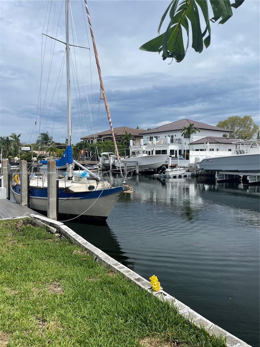 BUILD YOUR WATERFRONT HOME IN BEAUTIFUL, GATED KEYSTONE POINT!!!
75' OF WATER FRONTAGE ON THIS DEEP WATER, DIRECT OCEAN ACCESS CANAL, CLOSE TO THE BAY WITH NO FIXED BRIDGES.
BACKYARD HAS GREAT SOUTHERN EXPOSURE.
CURRENT HOME ON PROPERTY IS A COMPLETELY ORIGINAL 1952 HOUSE.
BEST SUITED FOR A NEW CONSTRUCTION PROJECT!!!
**PROPERTY IS IN NEED OF NEW SEAWALL**