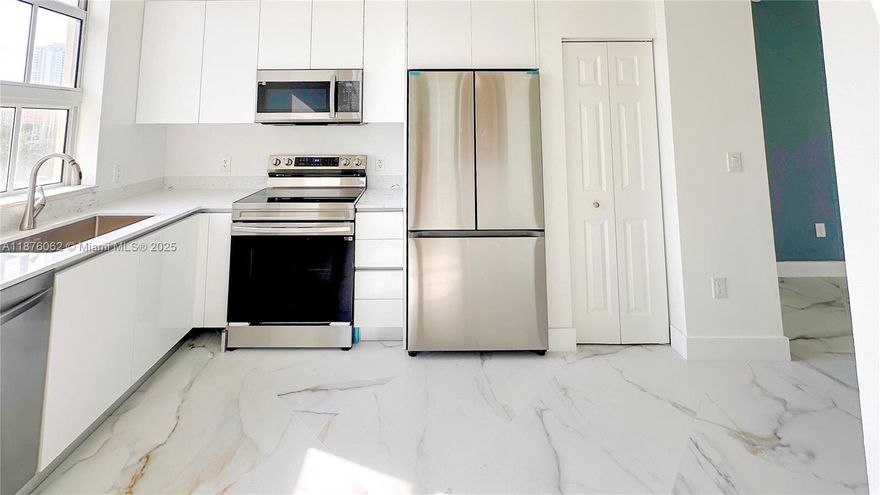 Unique & modern 3-bedroom, 2-bath corner unit at Alaqua, beautifully updated with porcelain floors, a redesigned kitchen with premium appliances, and elegant finishes. The bright open layout with 10-ft ceilings extends to a private balcony overlooking the waterway. Features include granite countertops, walk-in shower, Roman tub, double vanities, full-size washer/dryer, and ample storage. Alaqua offers resort-style amenities: Mediterranean courtyard, oversized pool and spa, fitness center, clubhouse, marina, valet, 24/7 security, and covered parking. Maintenance covers cable, internet, and water. Ideally located near Aventura Mall, dining, schools, houses of worship, beaches, and parks.